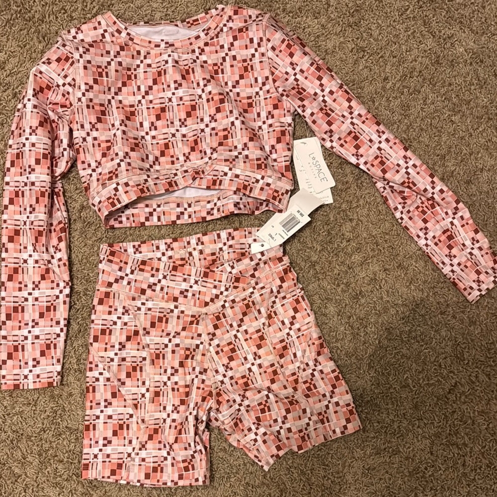 L space Carter bike short and aim high top set
